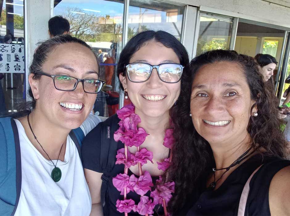 Three woman standing next to each other