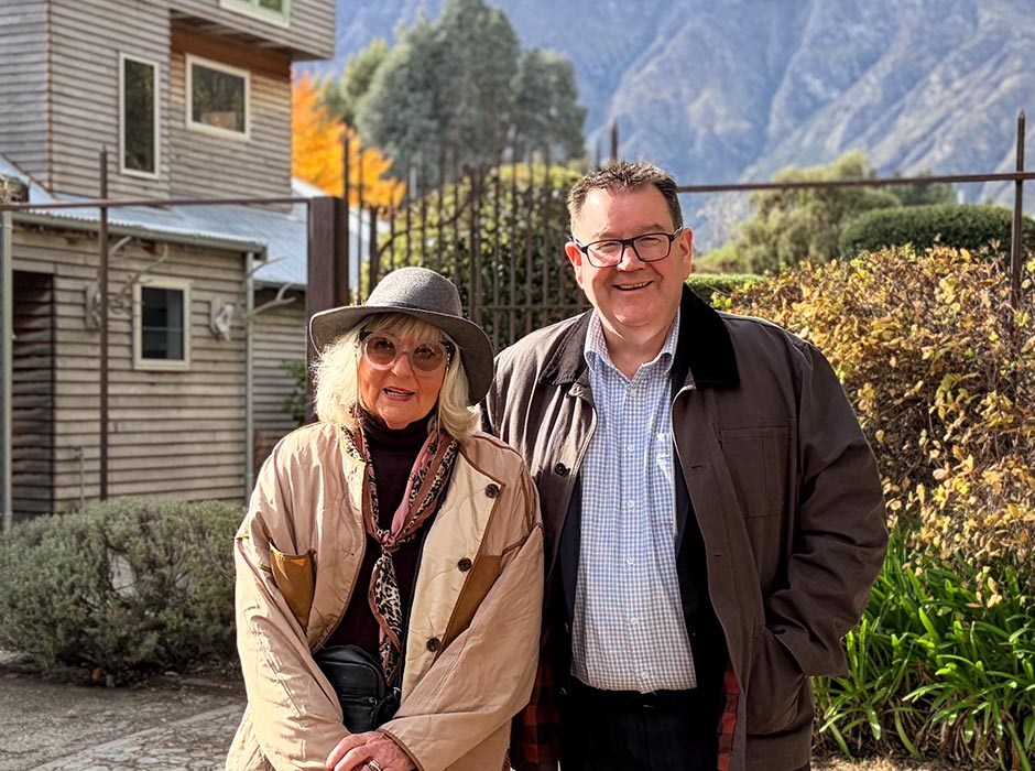 A woman and man are pictured in Queenstown.