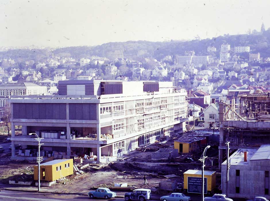 a faded photo of a building partially constructed 