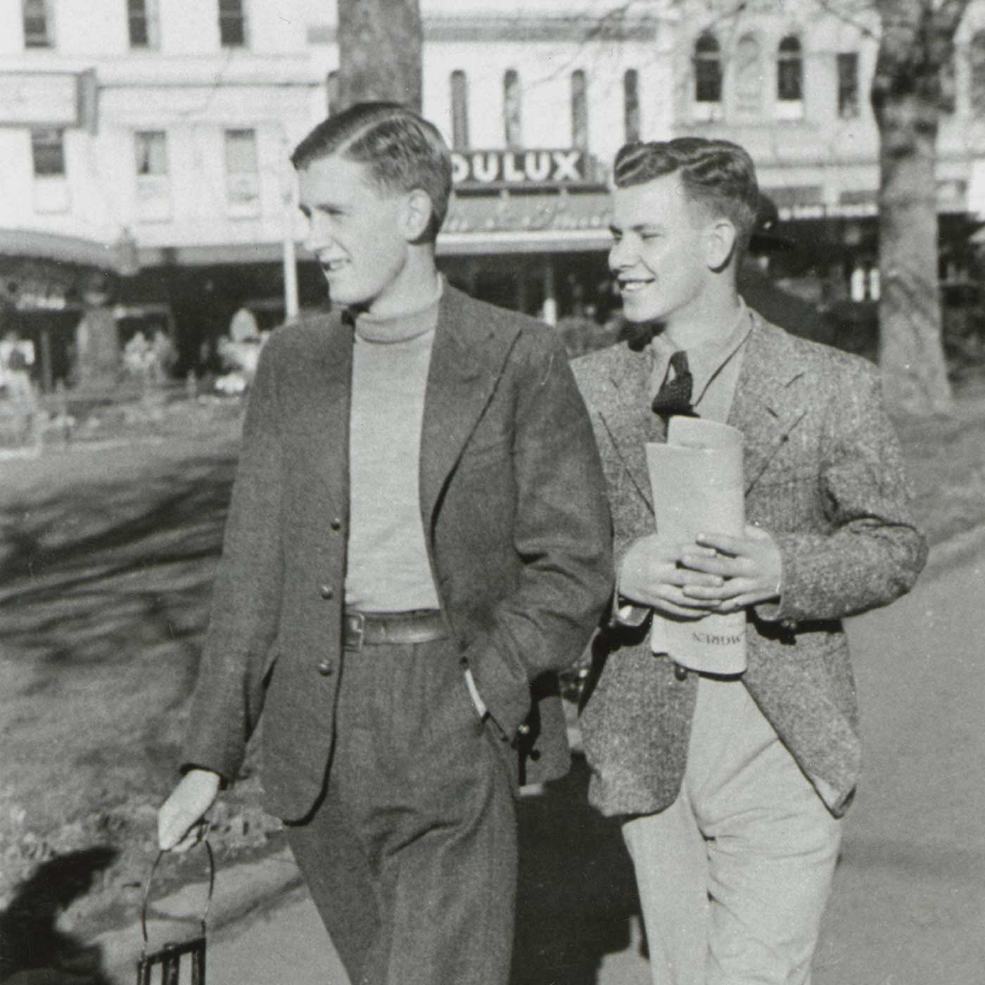 Two people walking banner