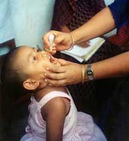 Child receiving polio vaccine drops in Bangladesh