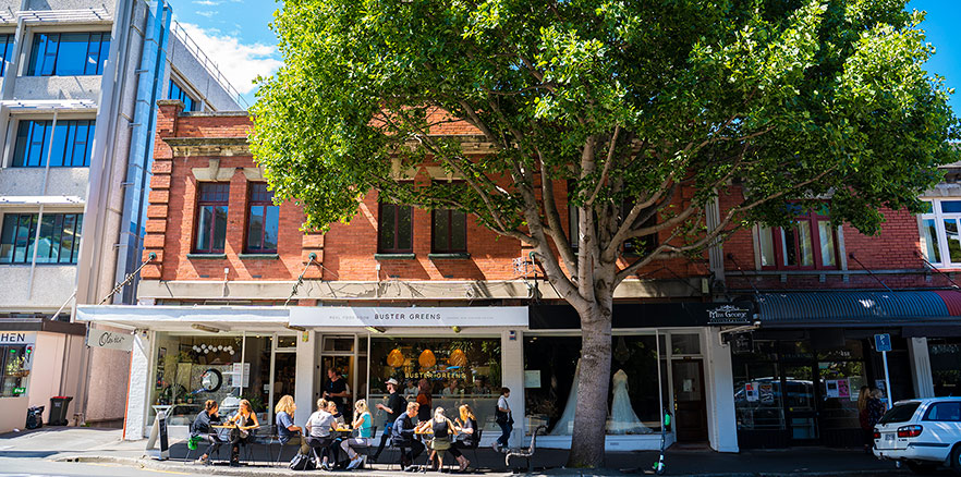 People dining outside Buster Greens on George Street