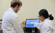 Donghui Zou teaches George Wiggins the art detecting bladder cancer cells in urine thumbnail