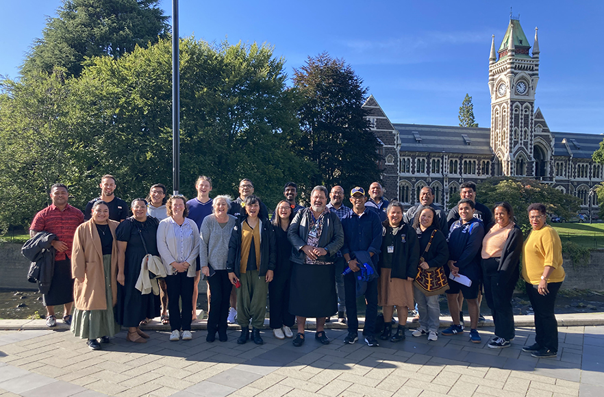 Otago's Pacific community standing with Naca Cawanibuka in front of the Clocktower Building image