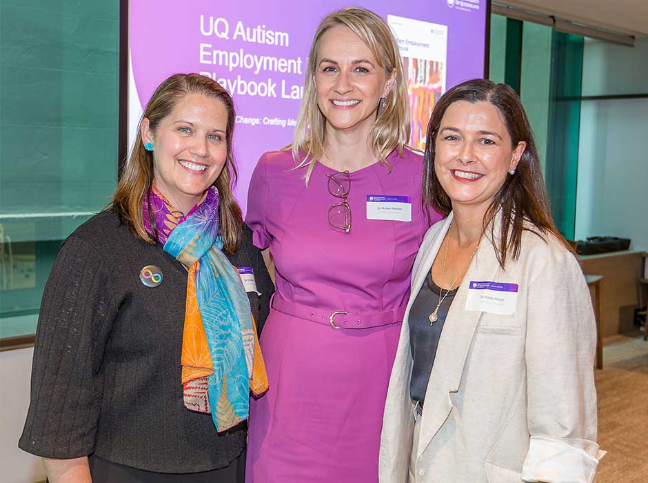 three woman standing next to each other smiling 