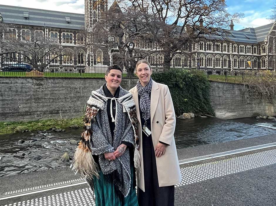 two women standing in front of the Leith 