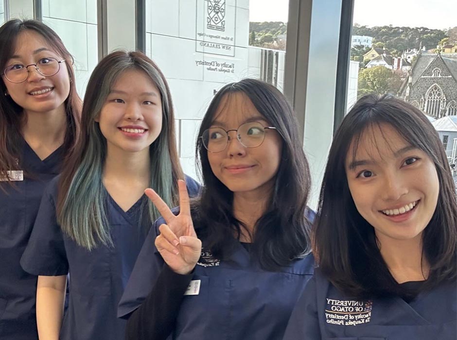 IMU students Reanne Heng, Xinyi Tan, Lee Yue Xin, and Racheal Chen at the Faculty of Dentistry. 
