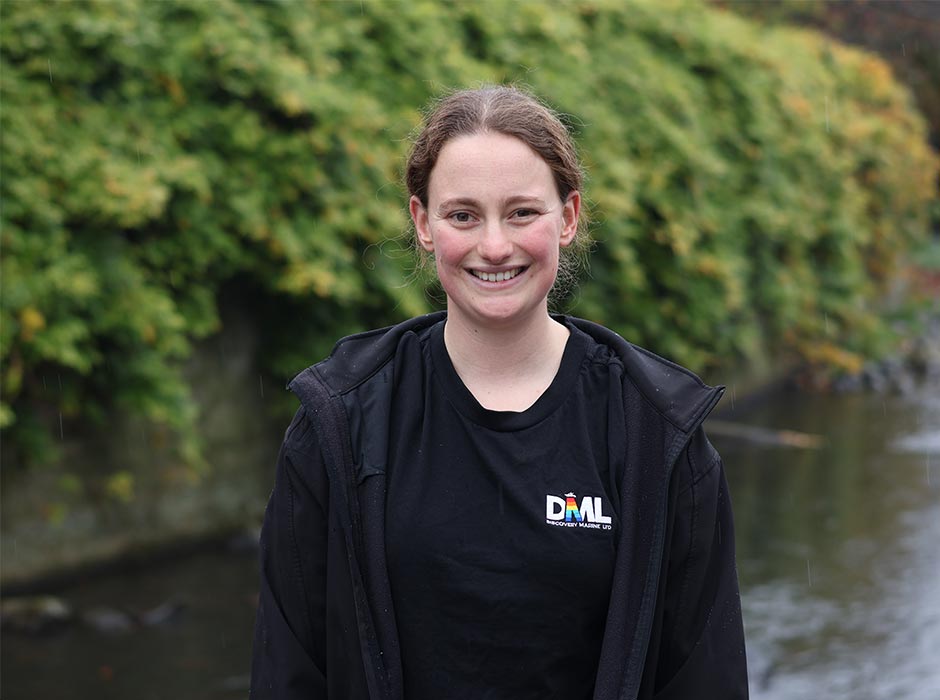 Student Grace Cinque is pictured in front of the Ōwheo river.