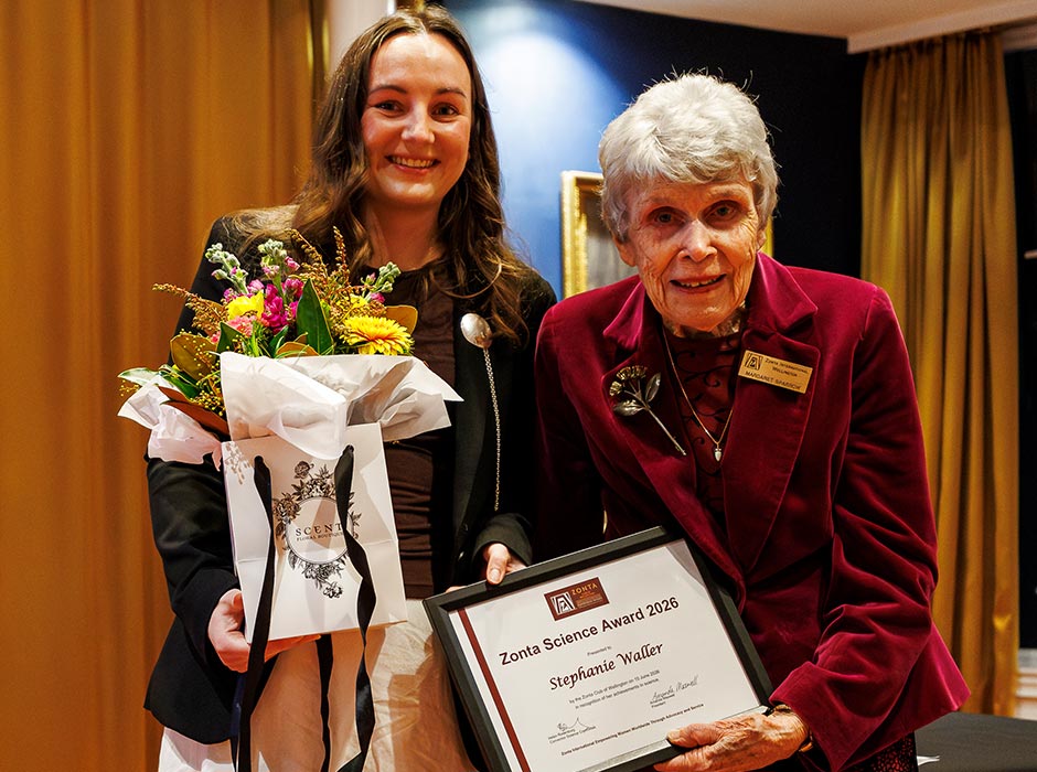 Dr Stephanie Waller is presented with a certificate by Dame Margaret Sparrow.