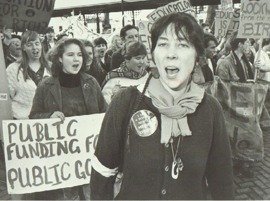A woman leads a protest march in the Octagon in 1991.