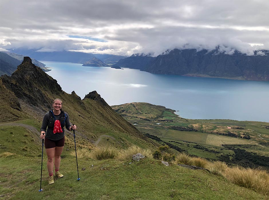 A woman is pictured in nature.