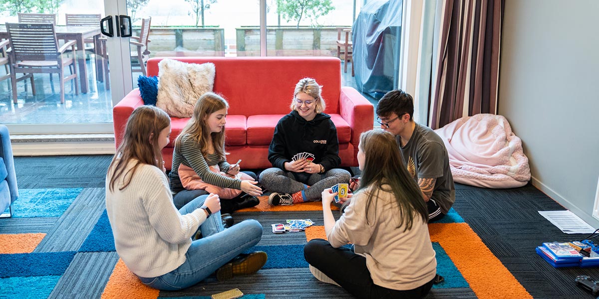 Te Rangi college students playing cards