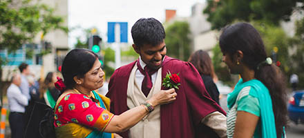 New postgraduate with mother and sister