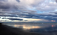 Nor'west arch over a Christchurch beach (2017)<br />Photo: Alice Milnes