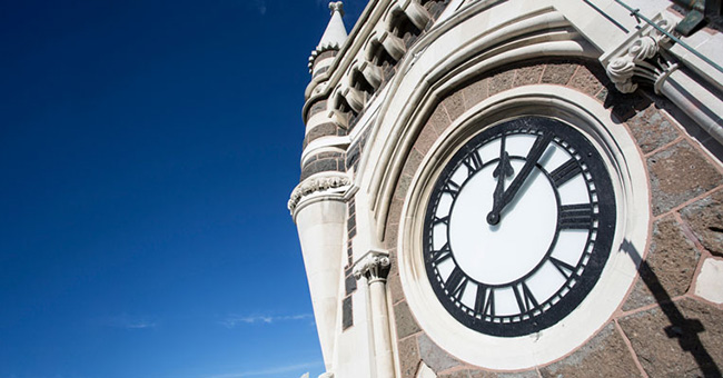 Close up of the Clocktower clock at jaunty angle.