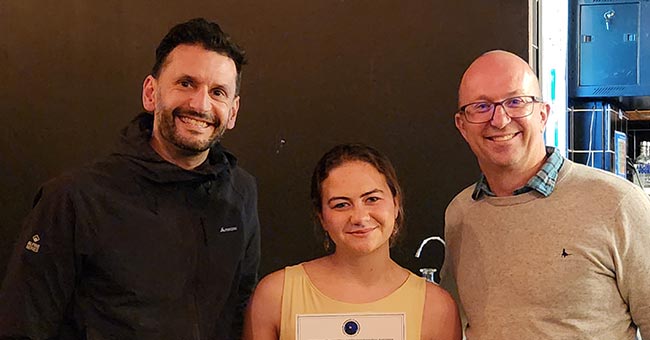 Dr Karl Iremonger, Kai Woolf and Hypothalamic Neuroscience and Neuroendocrinology Australasia President Professor Zane Andrews with her awards received at the recent Medical Sciences Congress in Christchurch. 