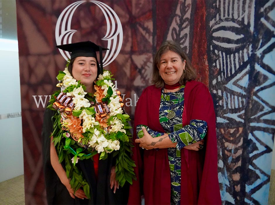 Head of Tourism Department, Associate Professor Anna Carr, right, supporting Evangeline Meti Nicholas at the Pacific graduation breakfast.  