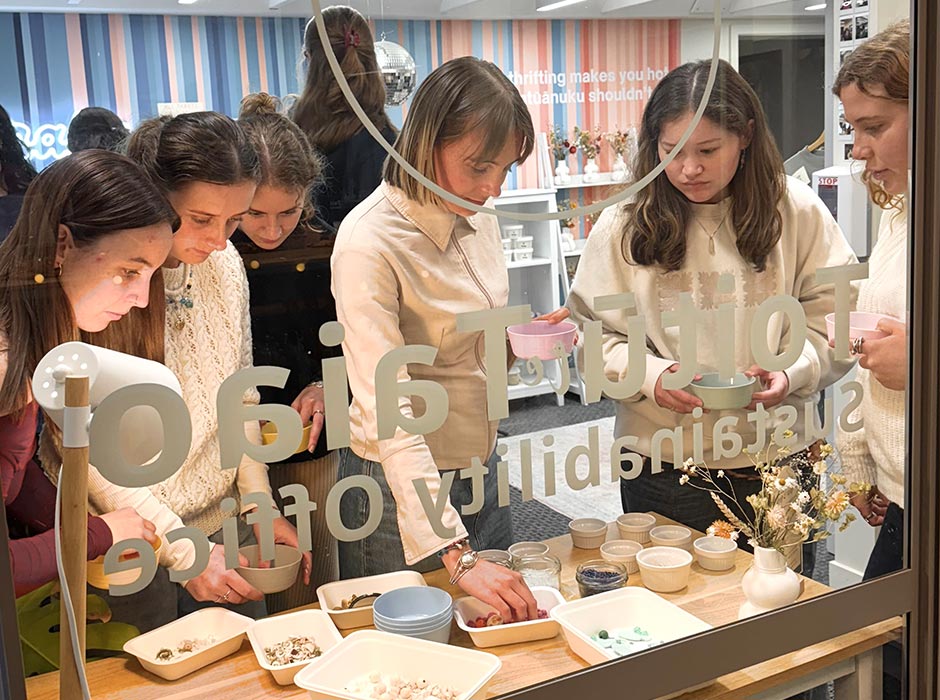 Students select pre-loved beads for a Crafty Club repurposing workshop at Te Oraka.