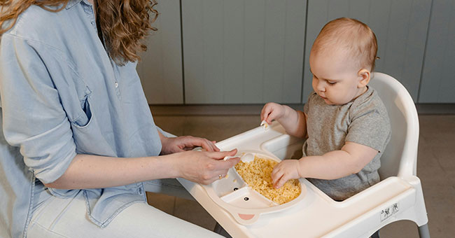 mum feeding baby