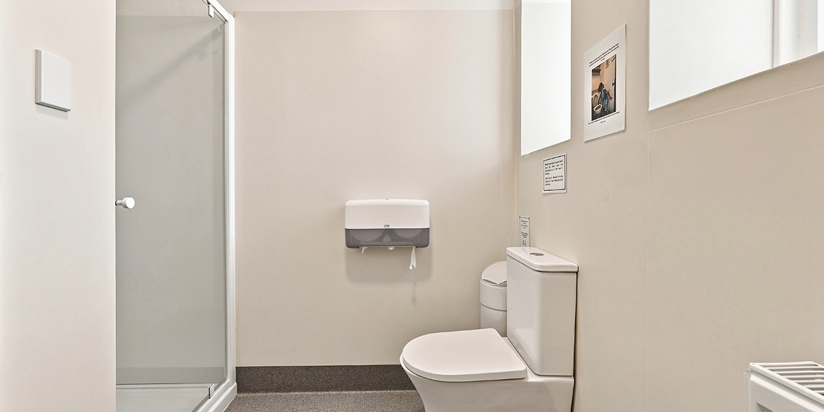 Image of bathroom with toilet and shower