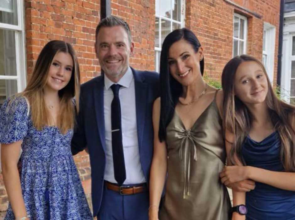 A family of four, mum dad and two daughters