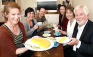 Photo of Keely McGlynn and guests at her cafe which promotes health portions of food. Thumb