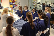 Niki Newman demonstrating the capabilities of SimMan3G “Alex” to a group of students from Rangi Ruru Girls High School GATE programme