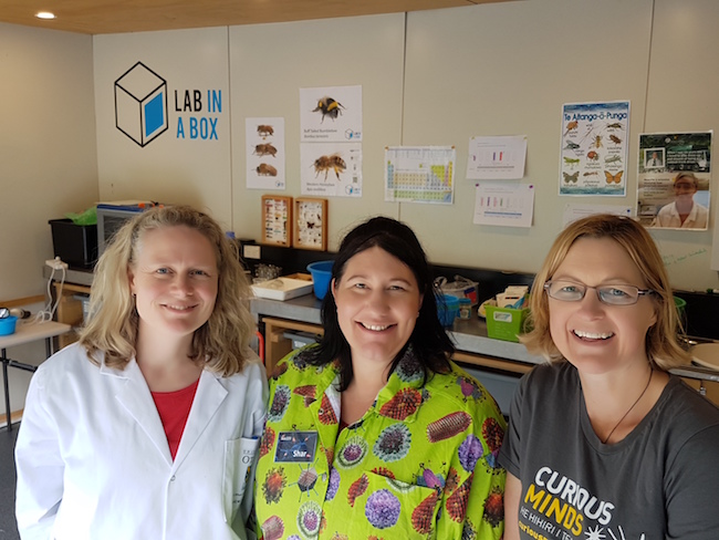 The Department of Biochemistry's Miriam Sharpe and Shar Rae-Whitcombe and Victoria University's Suzanne Bassett stand in the Lab in a Box