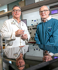 Kurt Krause and Greg Cook in lab-cover image