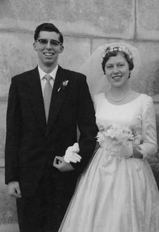 Two people in wedding attire