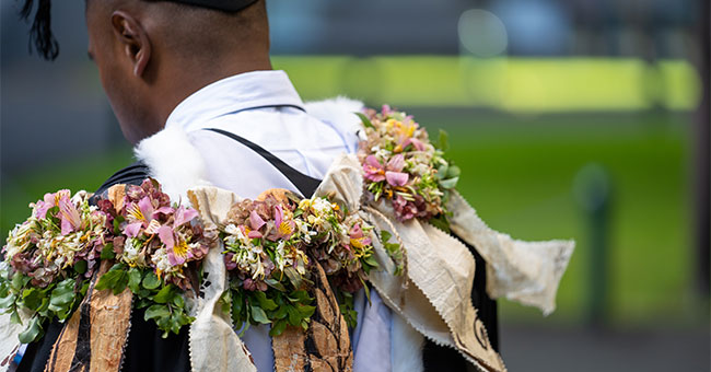 student in graduation regalia 