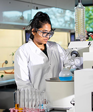 Research tile-Female Researcher in Chemistry Lab 2020 1x