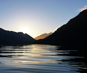 Late evening fieldwork on Lake Hauroko, Fiordland National Park.  