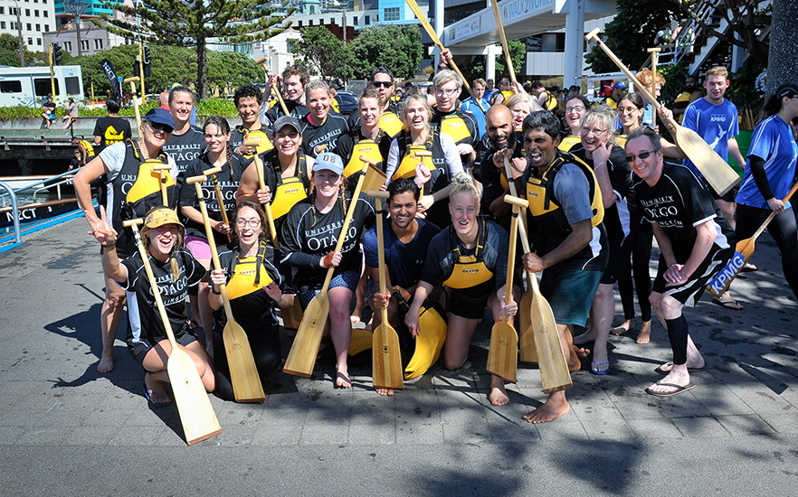 University of Wellington dragon boat team posing at the wharf image