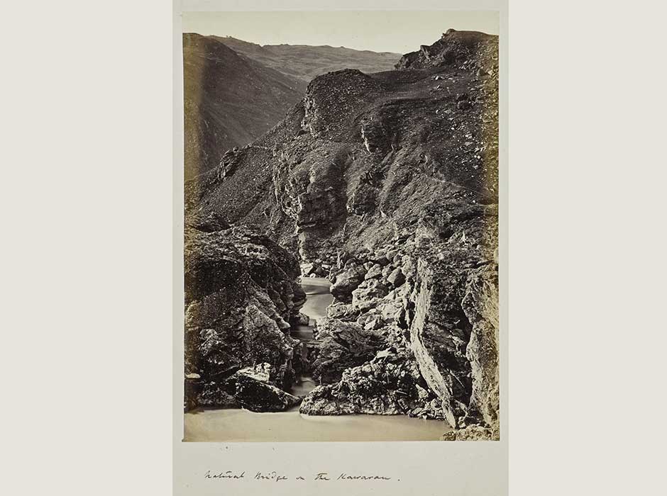 a black and white photo of an old bridge in the Kawarau 1865