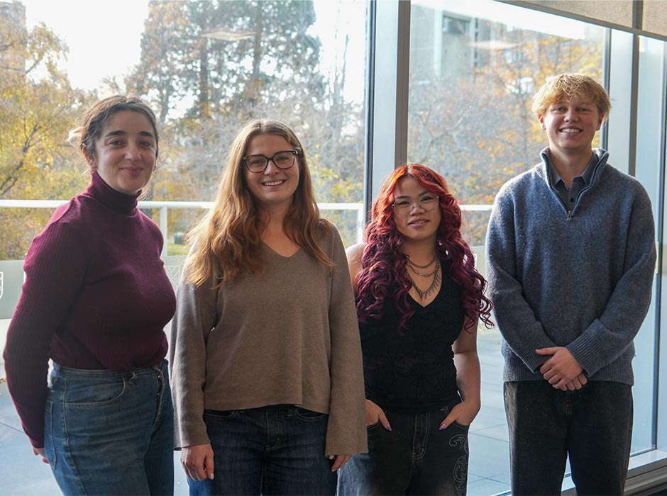 Group shot of four students