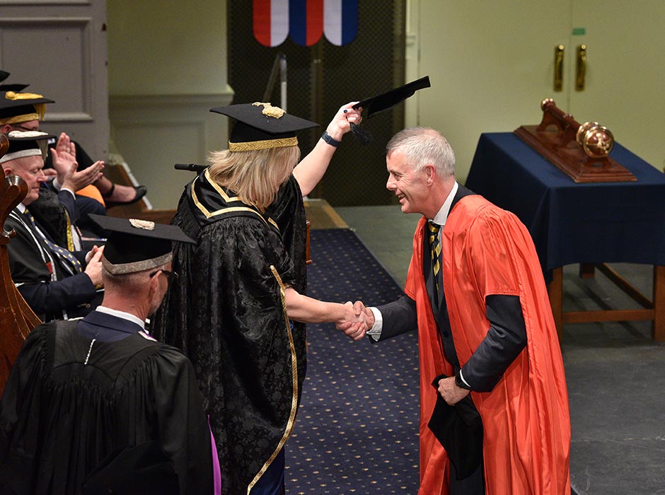 Deputy Vice-Chancellor Research and Enterprise Professor Richard Blaikie receives his Honorary Doctor of Science from Otago Chancellor Trish Oakley.