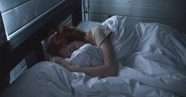 A generic image of a woman sleeping
