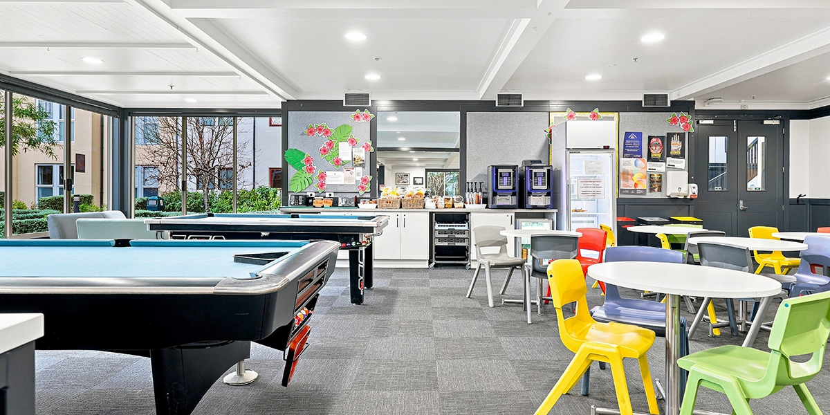 Main common area with pool table and tea and coffee making facilities