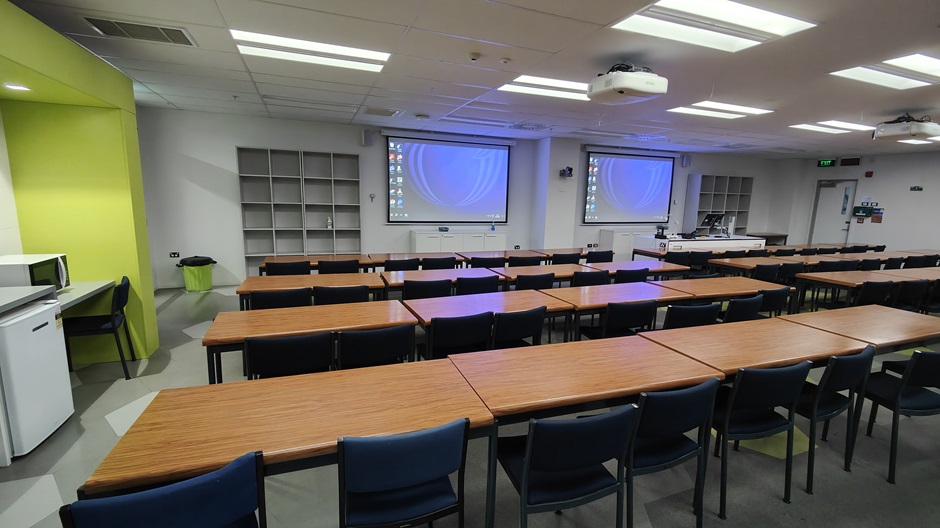 View of Mellor Laboratories room ME215, showing rows of tables and chairs