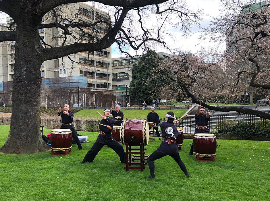 six people playing drums
