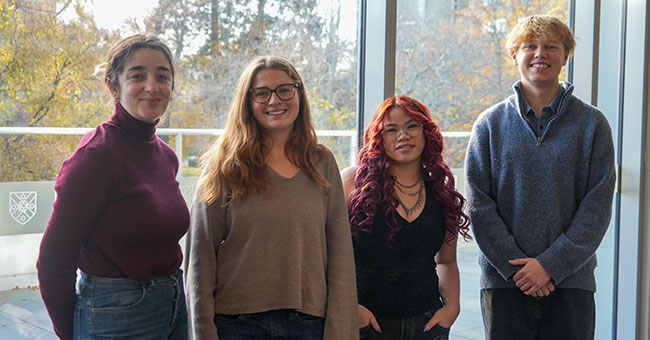 Group shot of four students