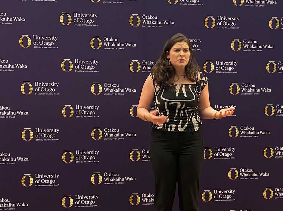 A woman speaking to an audience