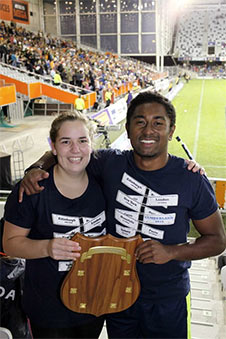 Poasa Cama and Claudia Hobbs with the X Challenge Shield