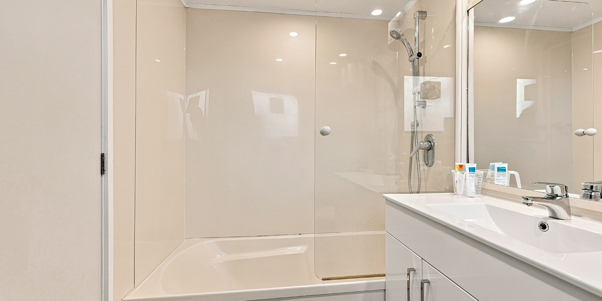 Bathroom with bath tub, shower and sink