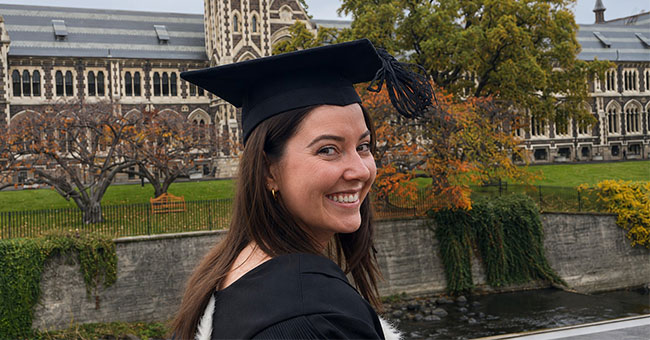 Mikayla King pictured in her graduation gown from her first graduation.