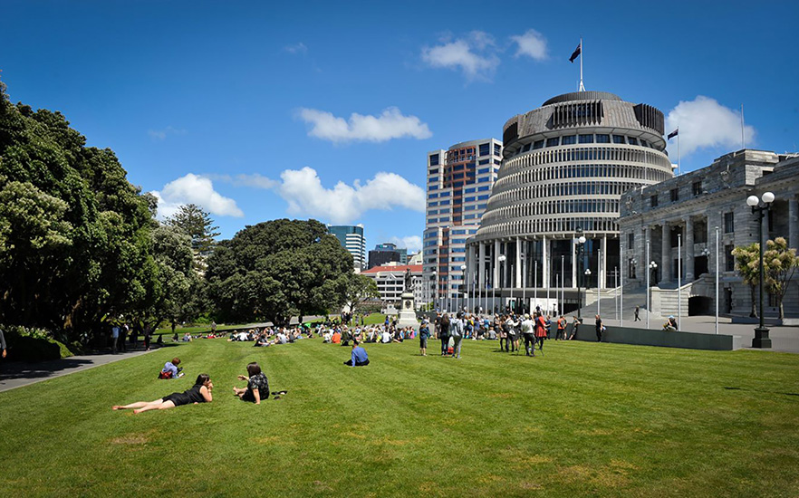 Parliament building and grounds with people in the gardens image
