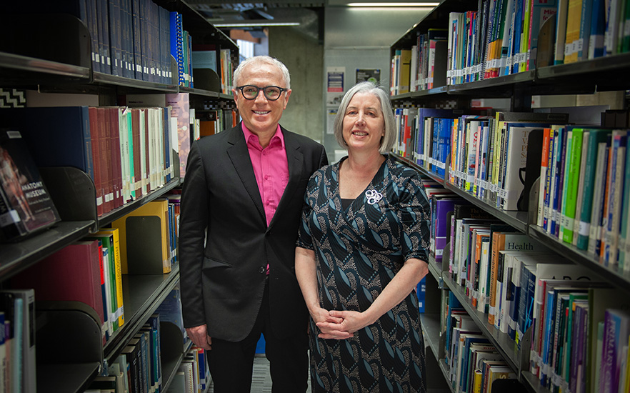 Professor Michael Baker and Dr Amanda Kvalsvig in library image 2021