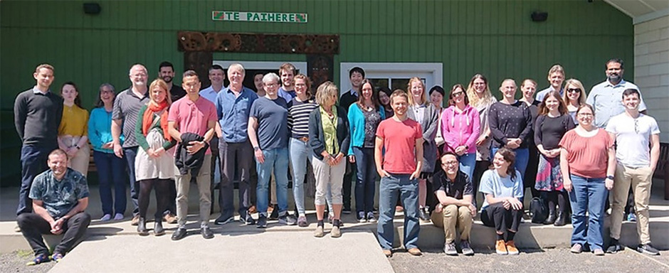 Centre for Neuroendocrinology staff and students pose for a group photo during a pōwhiri at Araiteuru Marae.