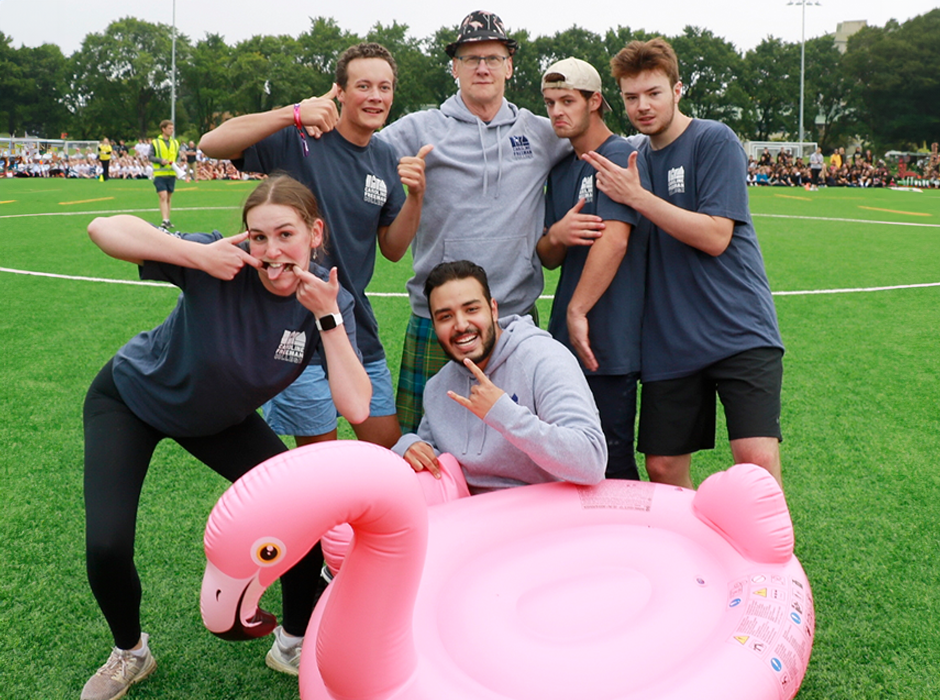 Chris Addington with Caroline Freeman residents and a blow-up flamingo